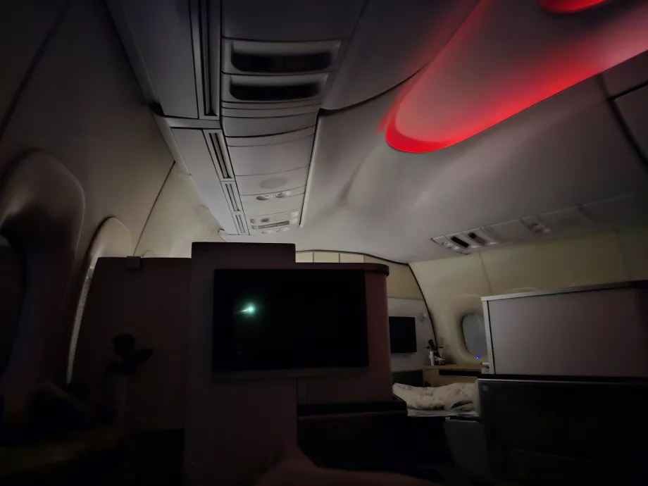 La lampada del passeggero nella fila di fronte a me