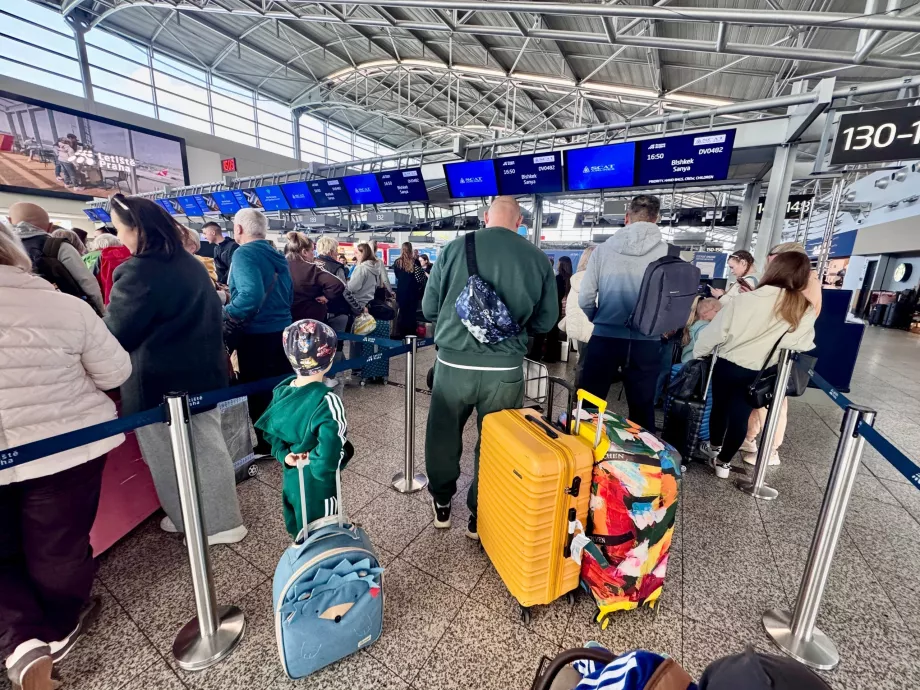 Check-in per il volo PRG-SYX con SCAT